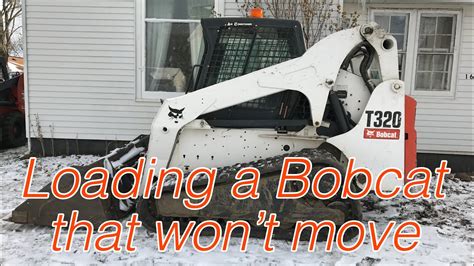 how to take forks off skid steer|skid steer won't remove bucket.